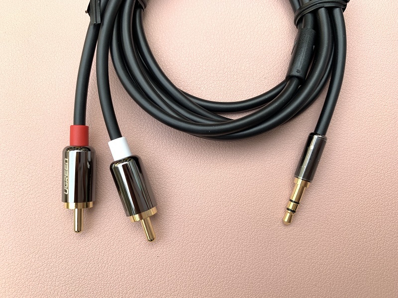 new - Dây Audio 3,5mm ra 2 đầu RCA dài 1.5M UGREEN AV116 10583 - Ugreen 10583
