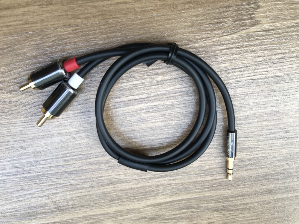 new - Cáp Audio 3.5mm Male To 2RCA Male dài 0.5m UGREEN 20779 - AV116