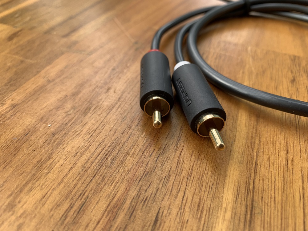 new - Cáp Audio 3.5mm Male To 2RCA Male dài 0.5m AV102 UGREEN 40423